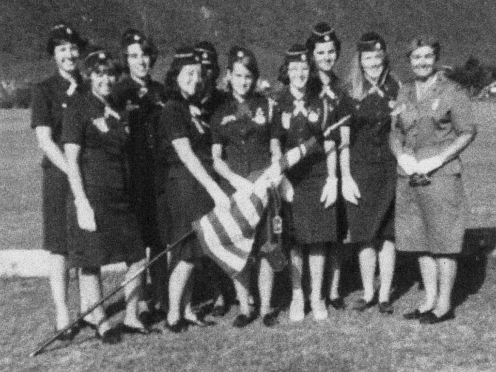 Ronnie Backenstoe in a photo with other members of the Girl Scouts. Backenstoe has sold cookies since she was 10.