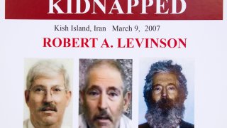 In this March 6, 2012, file photo, an FBI poster showing a composite image of former FBI agent Robert Levinson, right, of how he could look after five years in captivity, and an image, center, taken from the video released by his kidnappers, and a picture before he was kidnapped, left, displayed during a news conference in Washington.