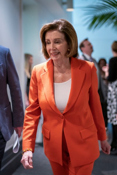 House Speaker Nancy Pelosi, D-Calif., arrives for a meeting with fellow Democrats on Capitol Hill in Washington, Feb. 26, 2020.