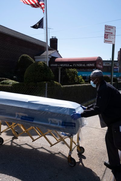 A man delivers caskets to the Gerard Neufeld Funeral Home