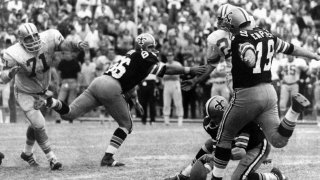 New Orleans Saints' Tom Dempsey moves up to kick a 63-yard field goal