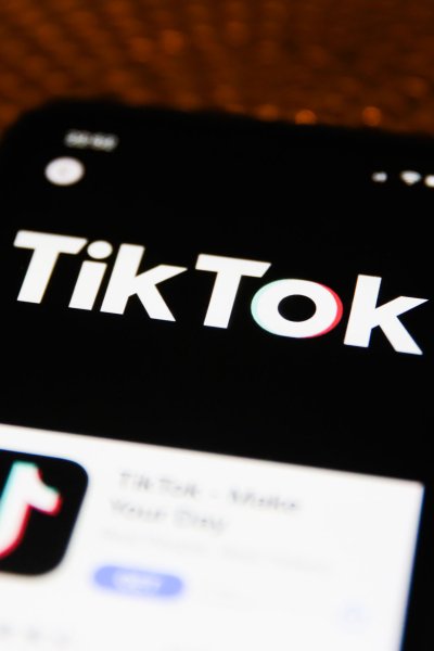 In this Feb. 20, 2020, file photo, the TikTok logo is seen displayed on a phone screen in Poland.