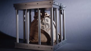 PHI money in cage