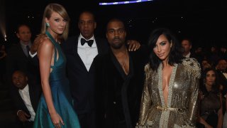 In this file photo, recording artists Taylor Swift, Jay Z and Kanye West and tv personality Kim Kardashian attend The 57th Annual GRAMMY Awards at the STAPLES Center on February 8, 2015 in Los Angeles, California.