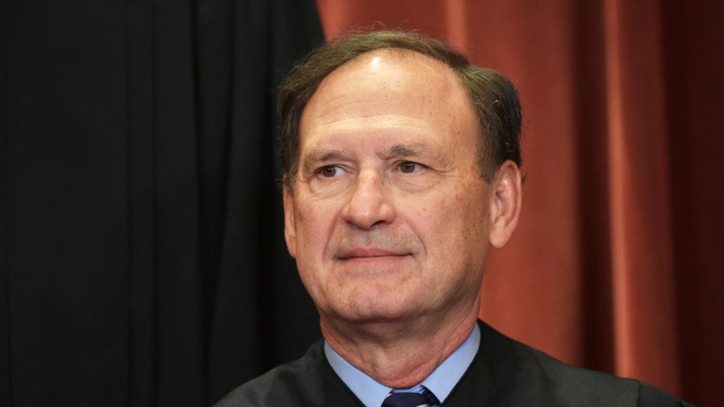 Associate Justice Samuel Alito poses for the official group photo at the US Supreme Court in Washington, DC on November 30, 2018.