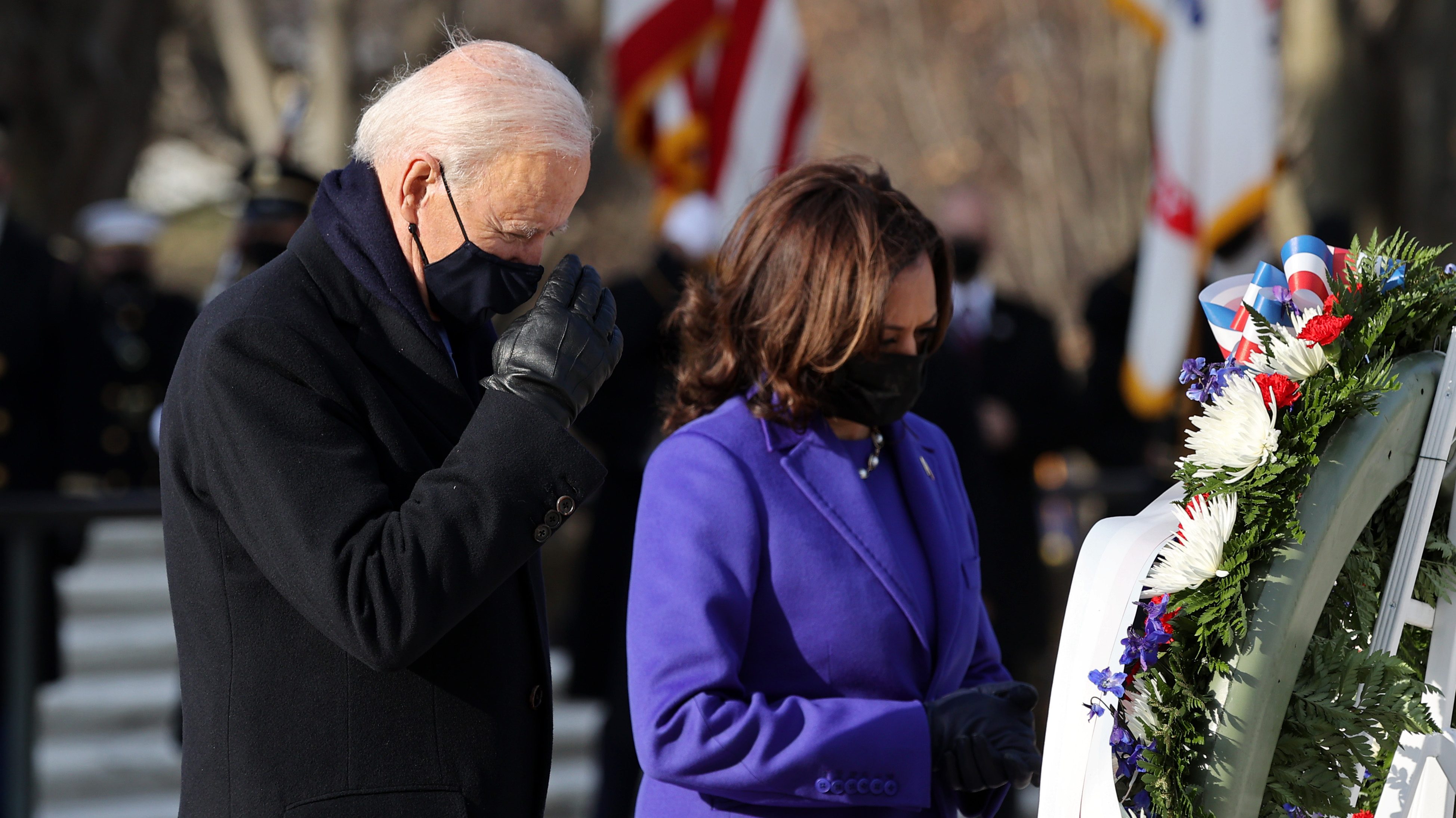 President Joe Biden and Vice President Kamala Harris attend a wreath-laying ceremony at Arlington National Cemetery's Tomb of the Unknown Soldier after the 59th Presidential Inauguration ceremony at the U.S. Capitol, Jan. 20, 2021 in Arlington, Virginia. (Chip Somodevilla/Getty Images)