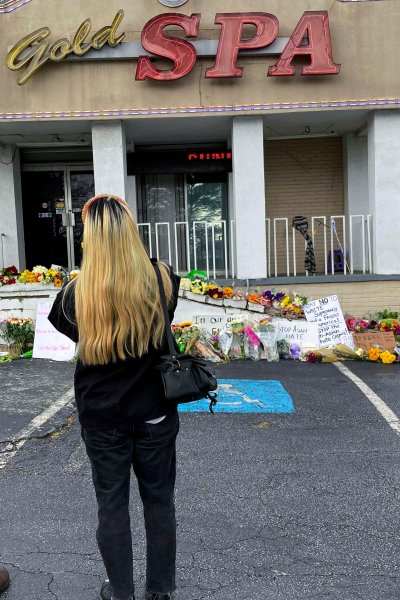 A makeshift memorial stands in front of the Gold Spa on Friday, March 19, 2021, in Atlanta. A 21-year-old man is accused of killing several people, most of whom were of Asian descent, at massage parlors in the Atlanta area.