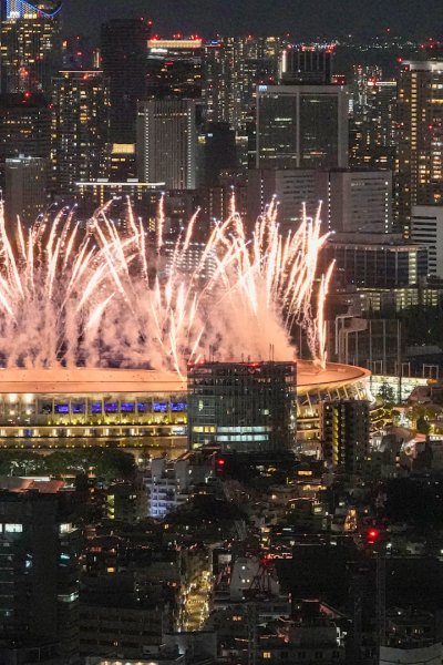 Fireworks illuminate the National Stadium in Tokyo