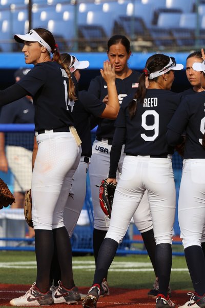 Pitcher Monica Abbott #14 of Team United States and teammates high five after their 2-0 win against Team Mexico during the Softball Opening Round on day one of the Tokyo 2020 Olympic Games at Yokohama Baseball Stadium on July 24, 2021 in Yokohama, Kanagawa, Japan.