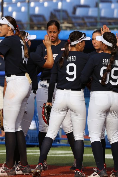 Pitcher Monica Abbott #14 of Team United States and teammates high five after their 2-0 win against Team Mexico during the Softball Opening Round on day one of the Tokyo 2020 Olympic Games at Yokohama Baseball Stadium on July 24, 2021 in Yokohama, Kanagawa, Japan.