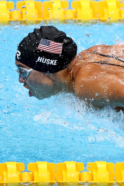 Torri Huske swims during the women’s 4x100m medley
