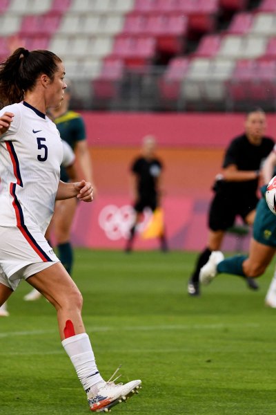 USA's defender Kelley O'Hara chases the ball during the Tokyo 2020 Olympic Games women's group G first round football match between USA and Australia