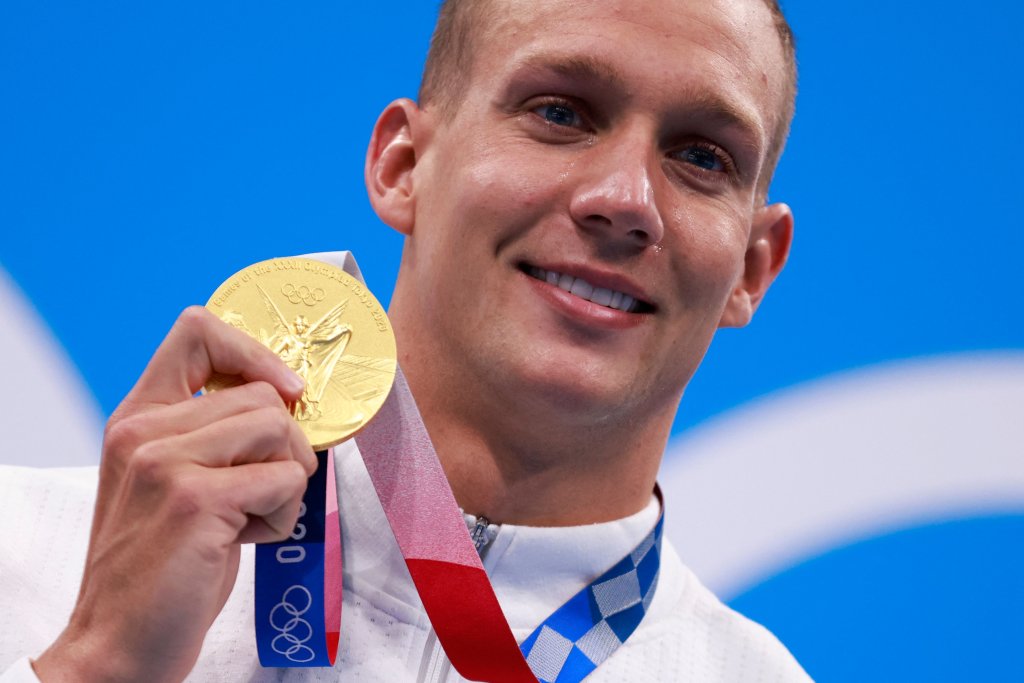 Caeleb Dressel poses with his medal