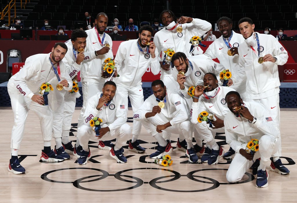 Team USA pose with their gold medals during the men's casketball medal ceremony on day fifteen of the Tokyo Olympic Games at Saitama Super Arena on Aug. 7, 2021 in Saitama, Japan. 