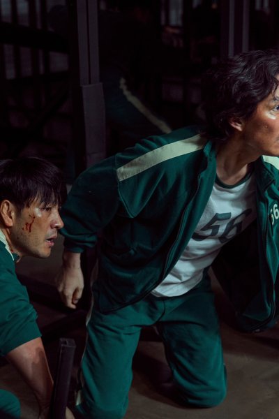 This undated photo released by Netflix shows South Korean cast members, from left, Park Hae-soo, Lee Jung-jae and Anupam Tripathi in a scene from "Squid Game."