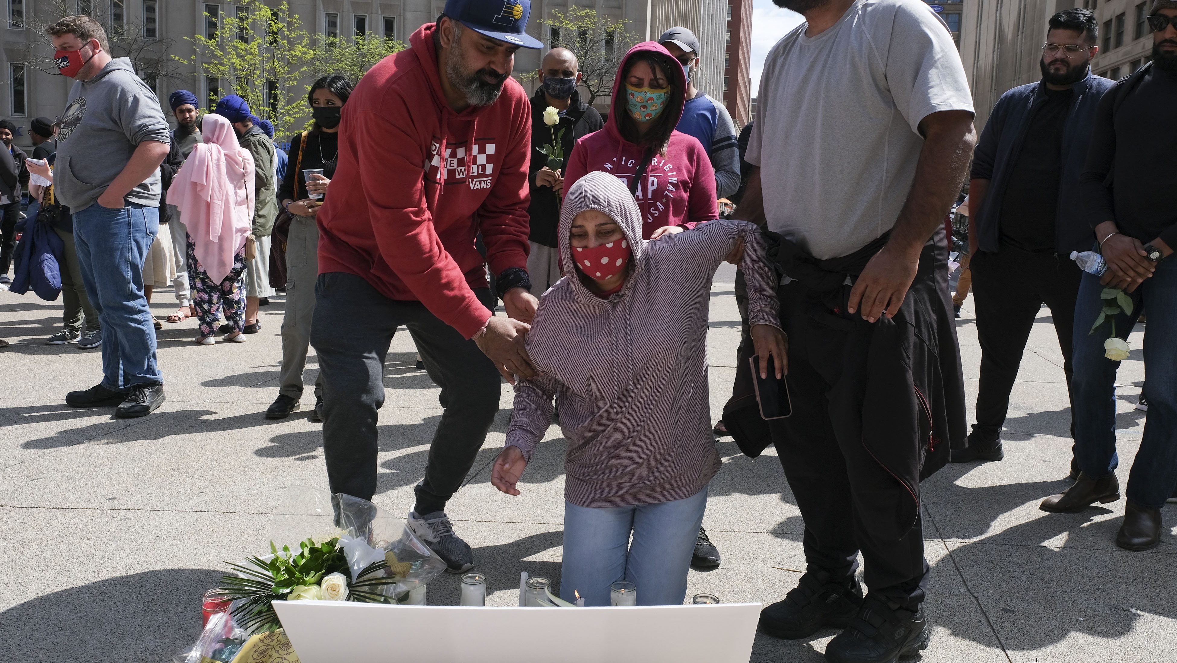 Family members of Amarjeet Johal, who was killed in a mass shooting, attend a vigil in Indianapolis, Indiana on April 18, 2021, to remember the victims of a mass shooting at a local FedEx facility which took the lives of eight people.