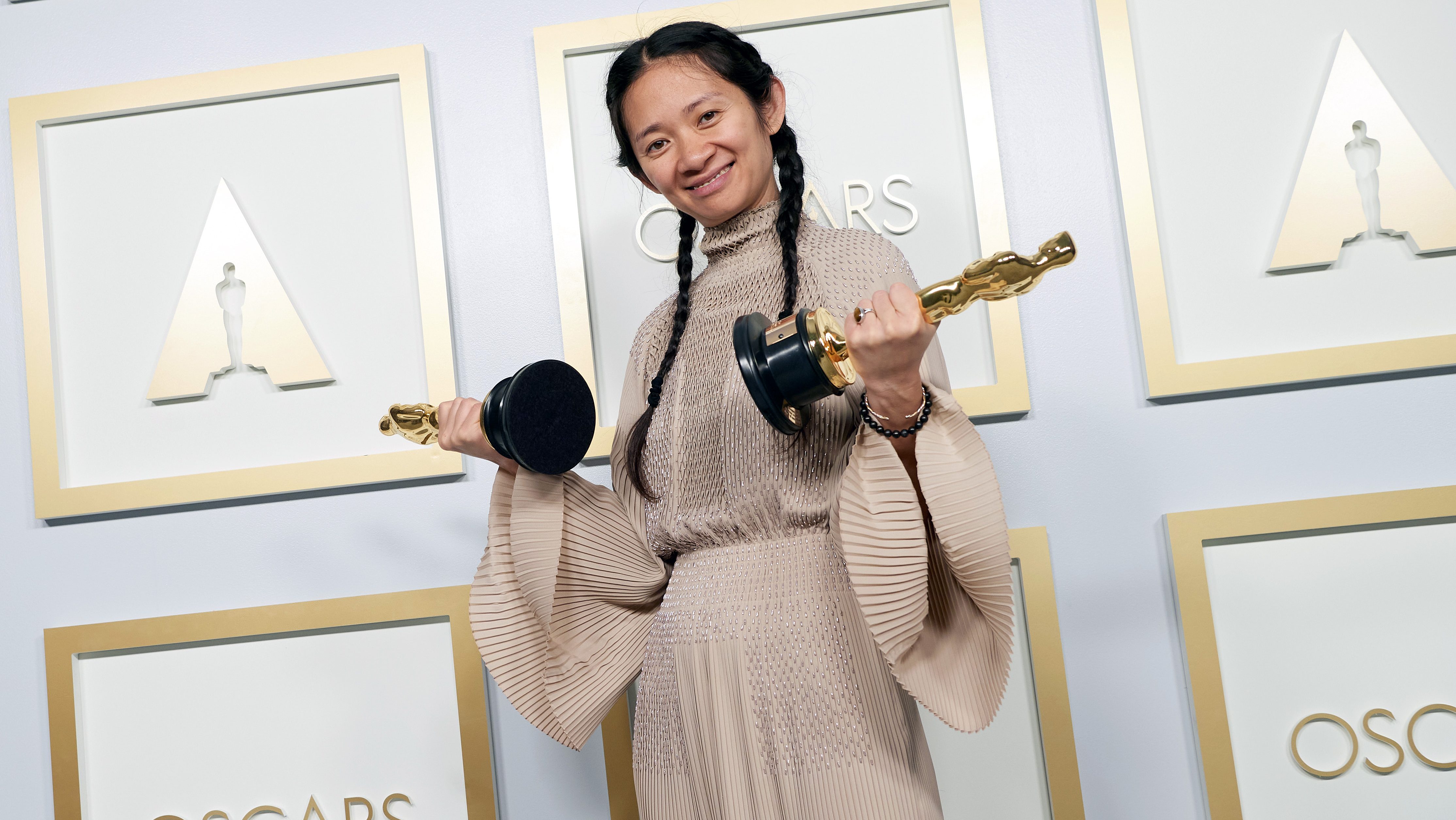 Chloé Zhao becomes the first woman of color to win Best Director during the 93rd Annual Academy Awards at Union Station on April 25, 2021 in Los Angeles, California. Zhao won for her work in 