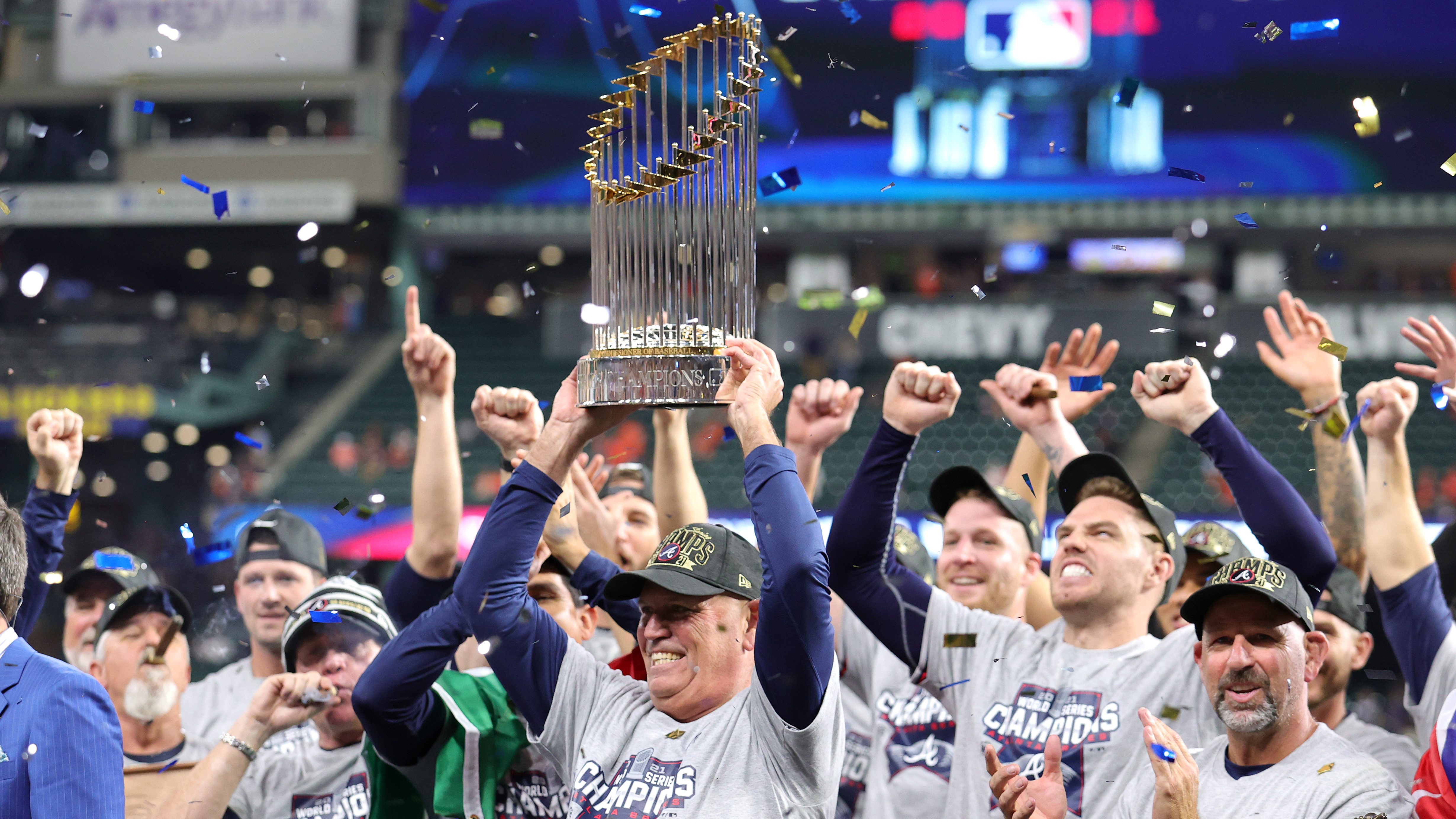 Manager Brian Snitker of the Atlanta Braves hoists the commissioner's trophy following the team's 7-0 victory against the Houston Astros in Game Six to win the 2021 World Series at Minute Maid Park, Nov. 2, 2021, in Houston, Texas.