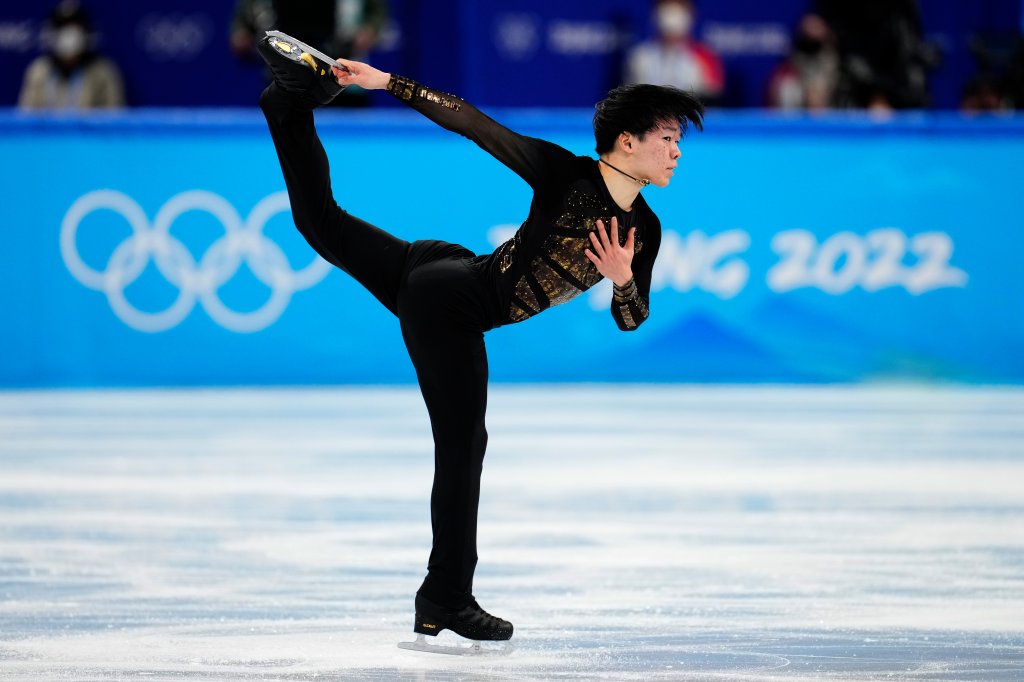 Yuma Kagiyama, of Japan, competes in the men's team free skate program during the figure skating competition at the 2022 Winter Olympics, Sunday, Feb. 6, 2022, in Beijing.