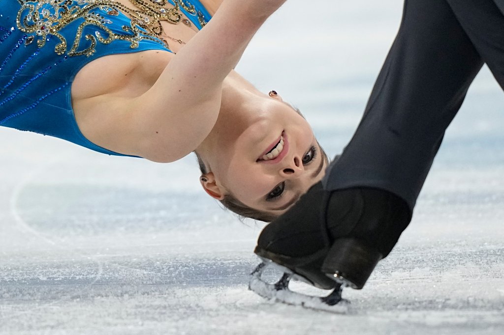 Anastasia Mishina and Aleksandr Galliamov, of the Russian Olympic Committee, compete in the pairs team free skate program during the figure skating competition at the 2022 Winter Olympics, Monday, Feb. 7, 2022, in Beijing. China. The pair finished first, earning their team 10 points with a score of 145.20.
