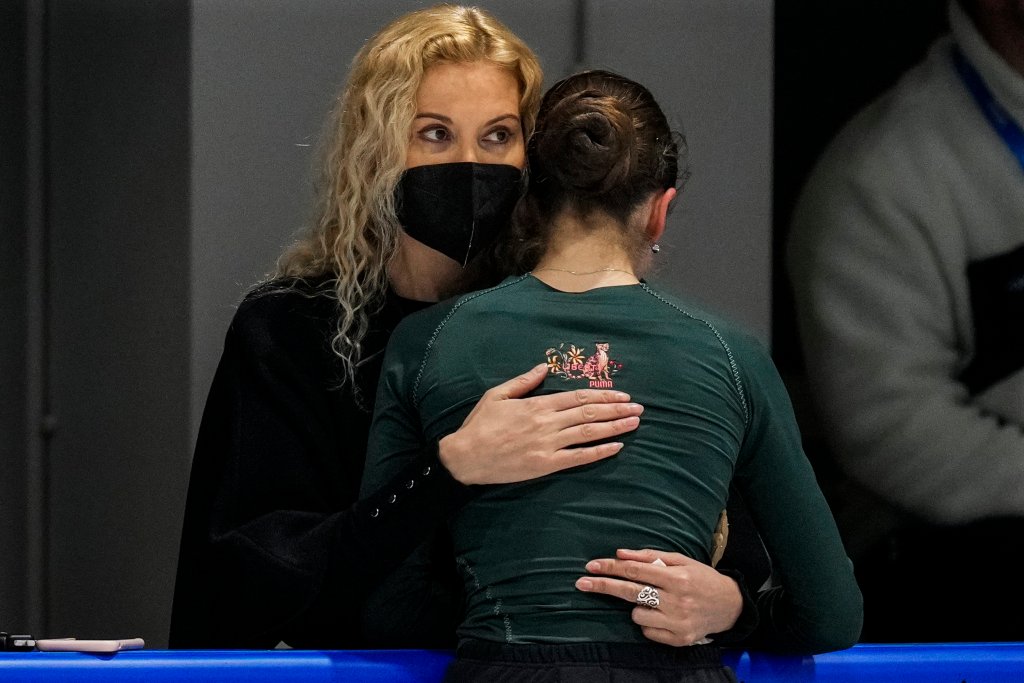 Coach Eteri Tutberidze, left, embraces Kamila Valieva, of the Russian Olympic Committee, during a training session at the 2022 Winter Olympics, Feb. 12, 2022, in Beijing.