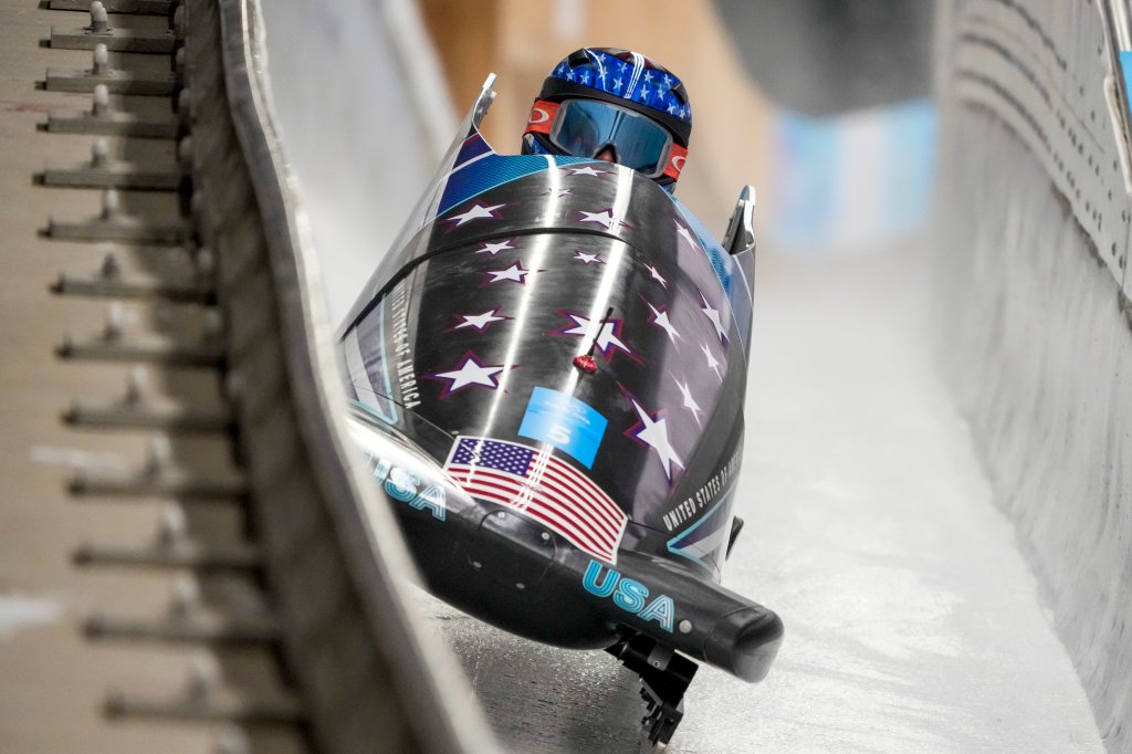 Kaillie Humphries, of United States, drives during the Women's Monobob heat 1 at the 2022 Winter Olympics, Feb. 13, 2022, in the Yanqing district of Beijing, China.