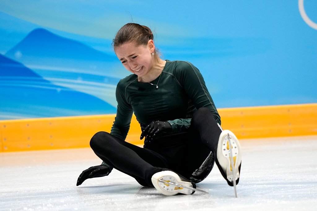 Kamila Valieva, of the Russian Olympic Committee, falls during a training session at the 2022 Winter Olympics, Feb. 13, 2022, in Beijing, China.