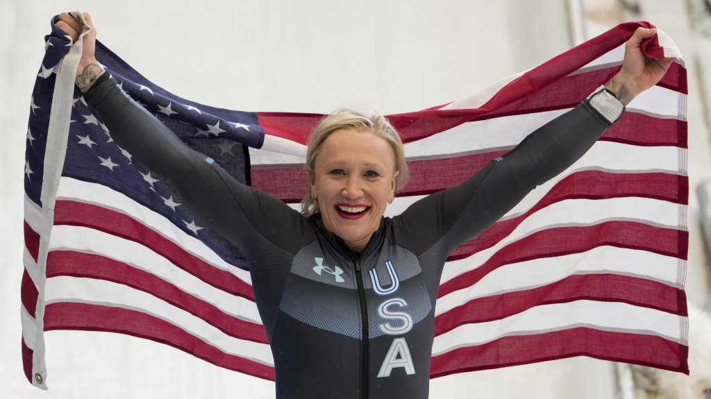 Kaillie Humphries, of the United States, celebrates winning the gold medal in the Women's Monobob at the 2022 Winter Olympics,Feb. 14, 2022, in the Yanqing district of Beijing, China.