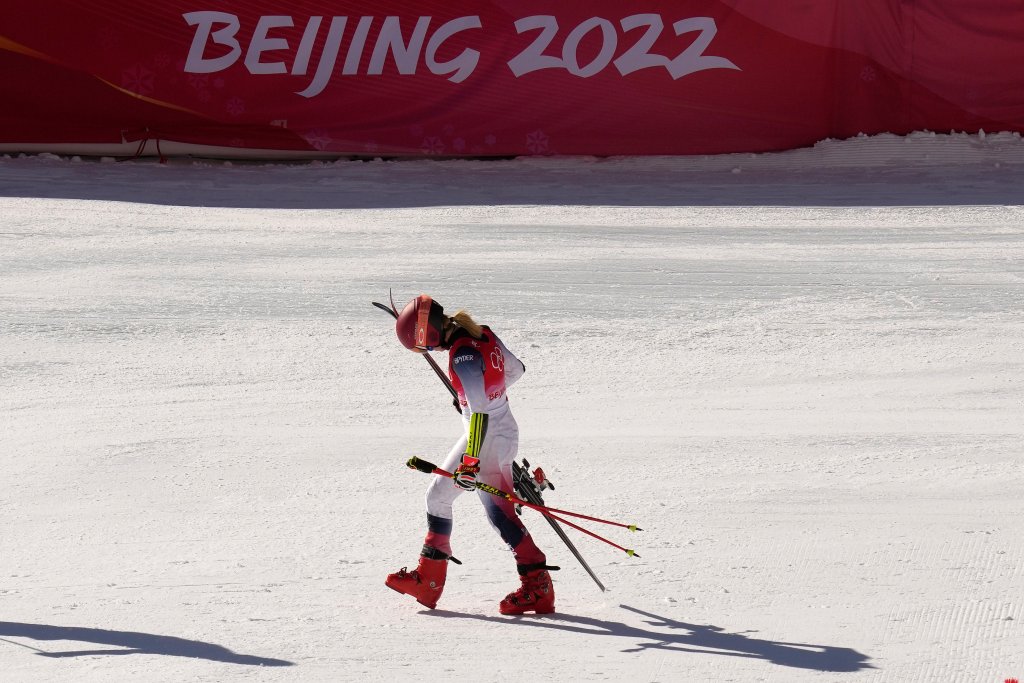 Mikaela Shiffrin of the United States leaves the finish area after racing in a semifinal of the Mixed Team Parallel Skiing event at the 2022 Winter Olympics, Feb. 20, 2022, in the Yanqing district of Beijing, China.