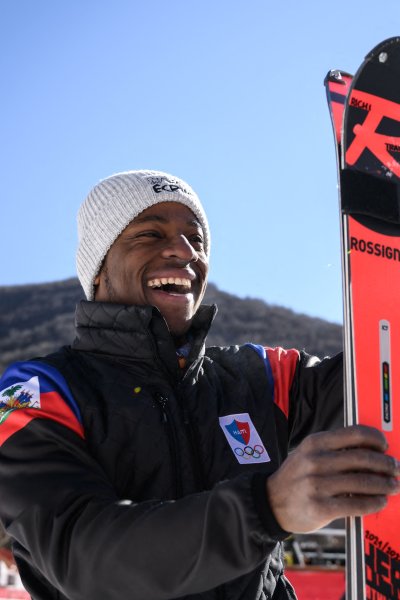 Richardson Viano who will become the first ever Haitian skier to compete in Winter Olympics reacts in the arrival area of the technical venue at the National Alpine Skiing Centre