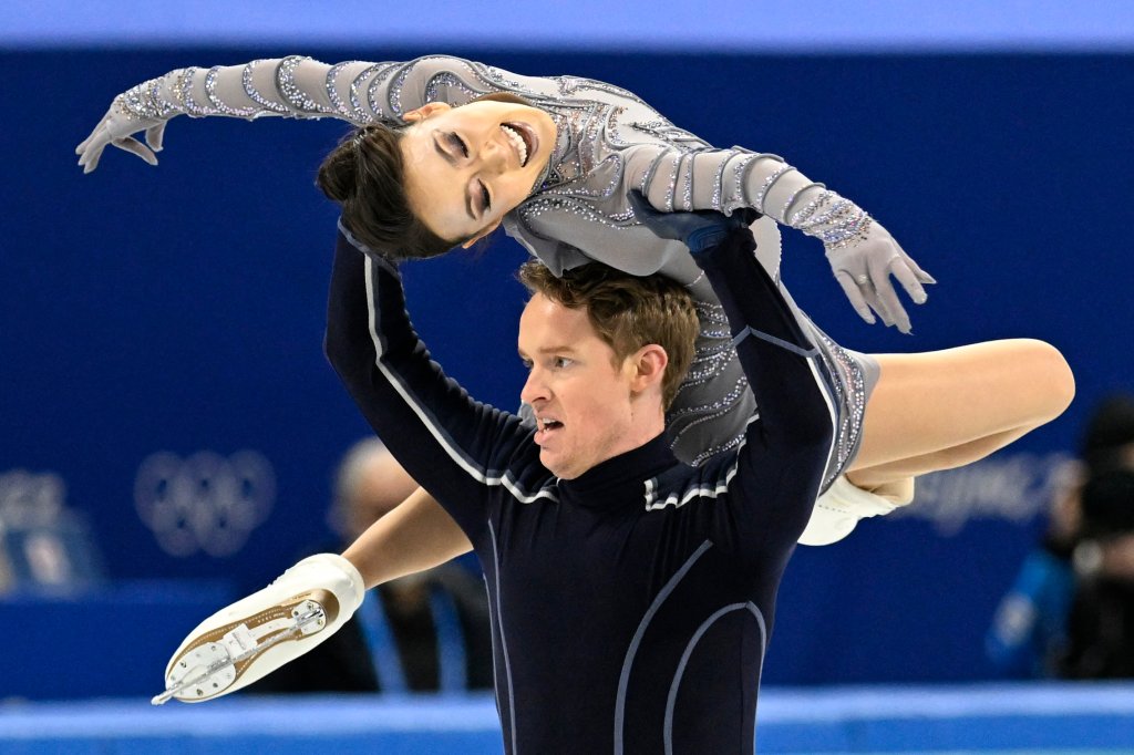 USA's Madison Chock and USA's Evan Bates compete in the ice dance free dance of the figure skating team event during the 2022 Winter Olympics at the Capital Indoor Stadium in Beijing on Feb. 7, 2022.