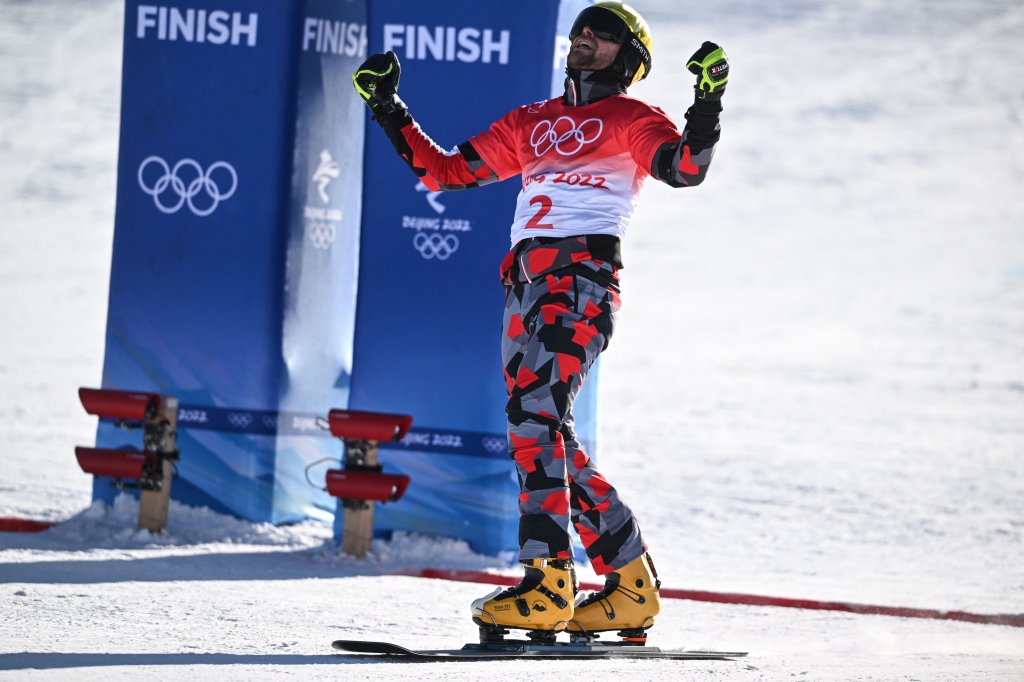 Austria's Benjamin Karl reacts after his run in the snowboard men's parallel giant slalom semi-finals during the 2022 Winter Olympics at the Genting Snow Park P & X Stadium in Zhangjiakou on Feb. 8, 2022.