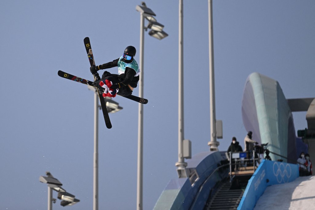 Norway's Birk Ruud carries a Norwegian flag during his final run during the Freestyle Skiing Men's Big Air final during the 2022 Winter Olympics at the Big Air Shougang in Beijing, China on Feb. 9, 2022. Ruud won gold in the event.