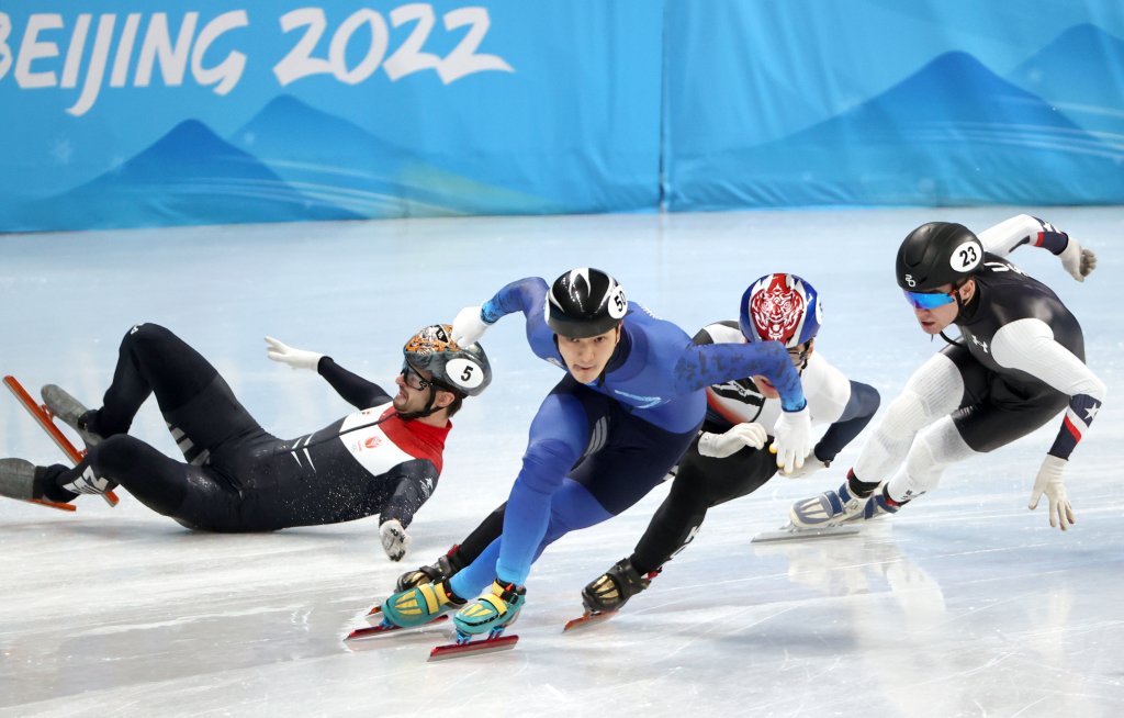 From left: Itzhak de Laat of the Netherlands, Abzal Azhgaliyev of Kazakhstan, Daeheon Hwang of South Korea, and Ryan Pivirotto of the USA compete in a men's 500m short track speed skating heat at the 2022 Winter Olympic Games, Feb. 10, 2022. Pivirotto, who took third during his heat, will advance to the quarterfinals.