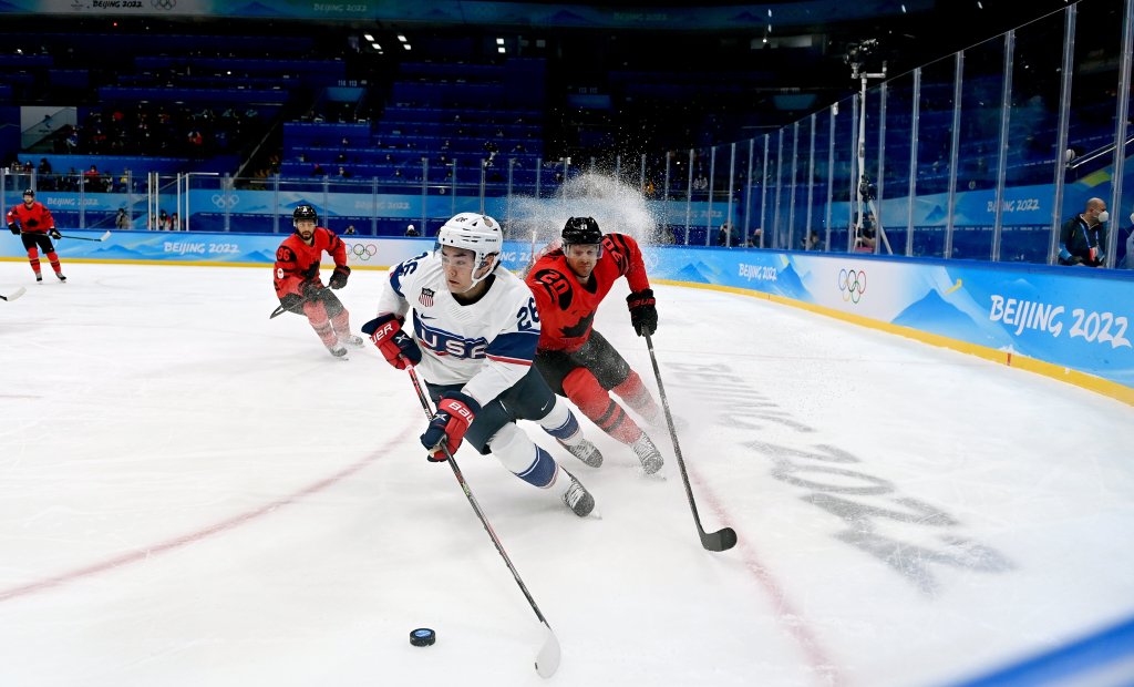 Sean Farrell of USA and Alex Grant of Canada during the Men's Preliminary Round Group A match between USA and Canada on day eight of the 2022 Winter Olympics at National Indoor Stadium in Beijing, China on Feb. 12, 2022.