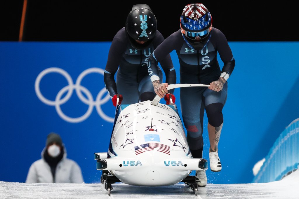 Kaillie Humphries and Kaysha Love of Team USA compete in a 2-woman bobsleigh heat at the 2022 Winter Olympic Games, Feb. 19, 2022.