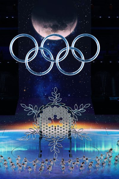 General View inside the stadium as a large Olympic ring logo and a large snowflake are seen during the Opening Ceremony of the Beijing 2022 Winter Olympics