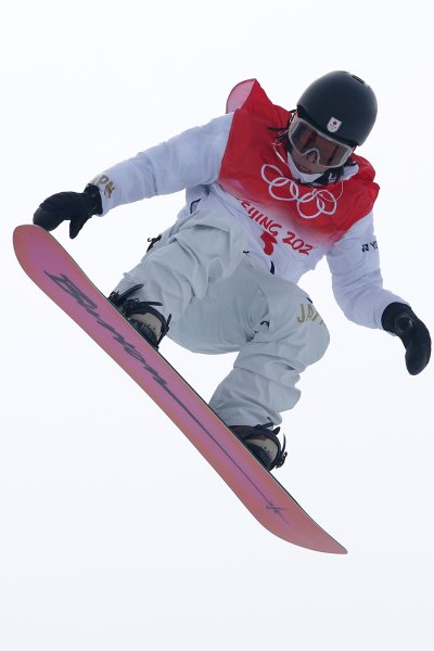 Ayumu Hirano of Team Japan performs a trick during the Men's Snowboard Halfpipe Qualification on Day 5 of the Beijing 2022 Winter Olympic Games