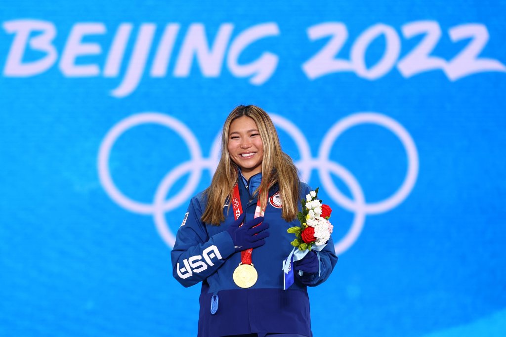 Chloe Kim of Team United States celebrates with her gold medal at the Women's Snowboard Halfpipe medal ceremony at the 2022 Winter Olympic Games, Beijing Medal Plaza, Feb. 10, 2022 in Beijing, China. 