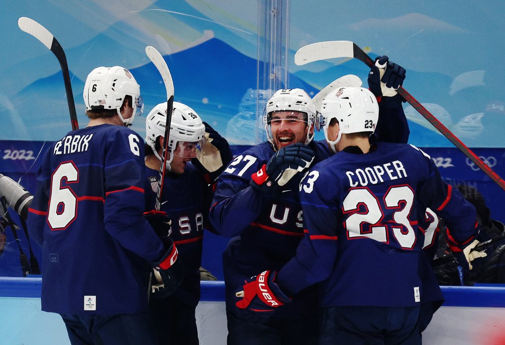 Noah Cates #27 of Team United States celebrates a goal with teammates in the second period of the game against Team China during the Men's Ice Hockey preliminary round at the 2022 Winter Games in the National Indoor Stadium, Feb. 10, 2022, in Beijing, China. 