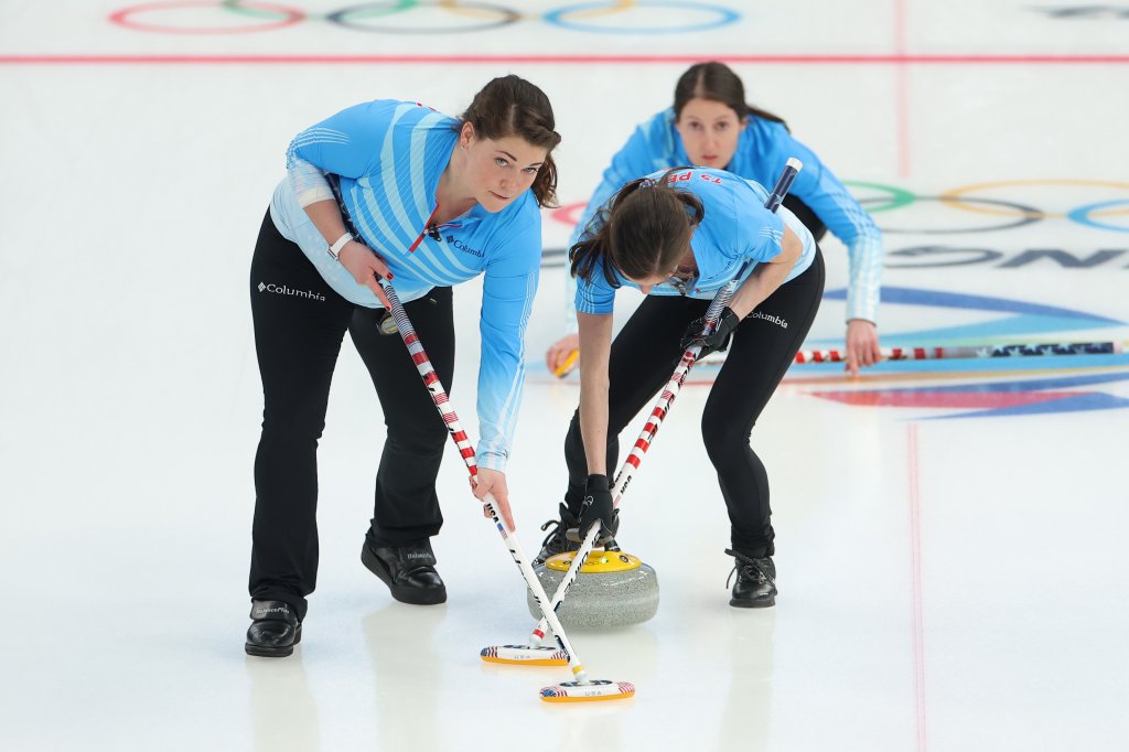 Becca Hamilton of Team United States, left, competes against Team Great Britain during the Women's Round Robin Curling Session at the 2022 Winter Olympic Games Feb. 12, 2022, in Beijing.