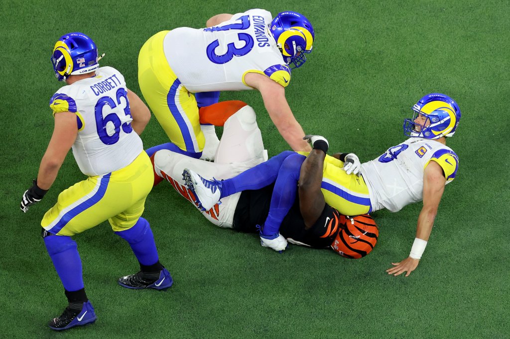 Matthew Stafford #9 of the Los Angeles Rams is sacked by D.J. Reader 