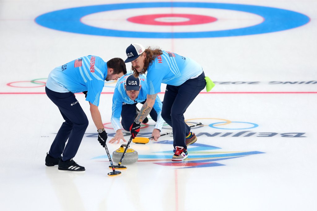 John Landsteiner, John Shuster and Matt Hamilton of Team United States compete against Team Switzerland during the Men’s Curling Round Robin Session 9 on day 11 of the 2022 Winter Olympics at National Aquatics Centre on Feb. 15, 2022, in Beijing, China.