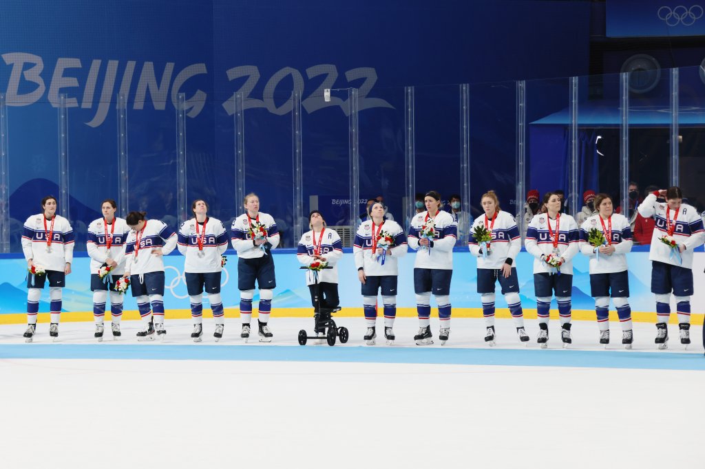 Team United States stands with their silver medals after the Women's Ice Hockey Gold Medal match between Team Canada and Team United States at the 2022 Winter Olympic Games, Feb. 17, 2022, in Beijing. 