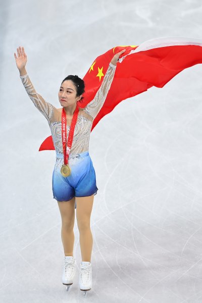 Gold medallists Wenjing Sui and Cong Han of Team China pose during the Pair Skating Free Skating Medal Ceremony