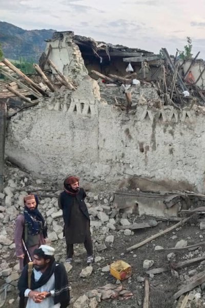 Men survey the damage after a powerful earthquake struck eastern Afghanistan.