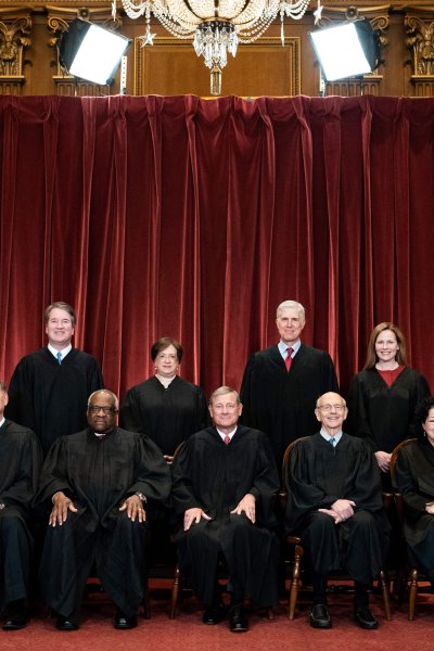 Seated from left: Associate Justice Samuel Alito, Associate Justice Clarence Thomas, Chief Justice John Roberts, Associate Justice Stephen Breyer and Associate Justice Sonia Sotomayor, standing from left: Associate Justice Brett Kavanaugh, Associate Justice Elena Kagan, Associate Justice Neil Gorsuch and Associate Justice Amy Coney Barrett pose during a group photo of the Justices at the Supreme Court in Washington, DC