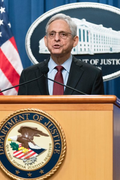 Attorney General Merrick Garland with Assistant Attorney General Kristen Clarke for the Civil Rights Division, speaks during a news conference at the Department of Justice in Washington, Thursday, Aug. 4, 2022.