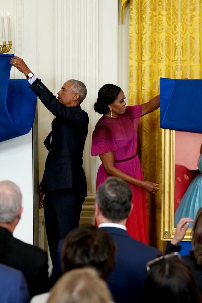 Former US President Barack Obama and First Lady Michelle Obama unveil their official White House portraits, in the East Room of the White House in Washington, DC, on September 7, 2022.